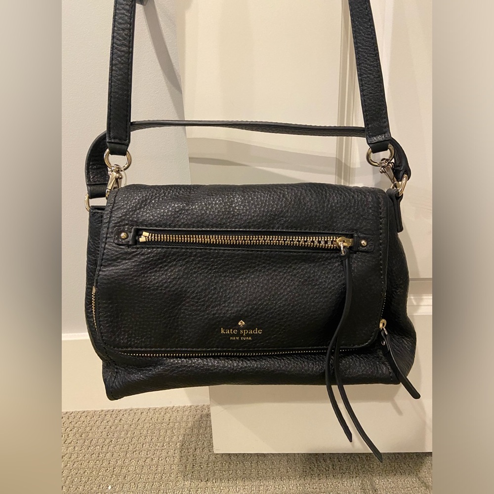 Kate Spade foldover crossbody purse with pocket in the fold.